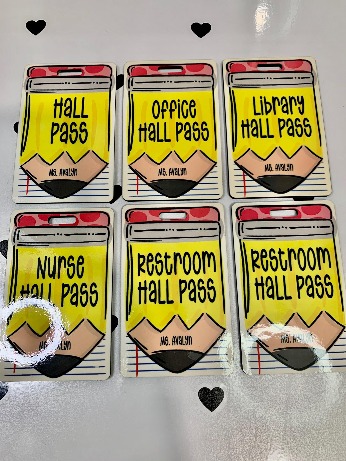 “Whimsical pencil and notebook themed hall pass for teachers”
“Double-sided classroom hall pass with lanyard”
“Back to school teacher gift – custom hall pass set”