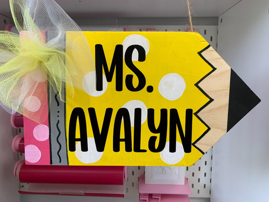 “Personalized pencil teacher door hanger with bow”

“Whimsical classroom door sign with polka dots”

“Custom teacher name wood pencil sign for school”