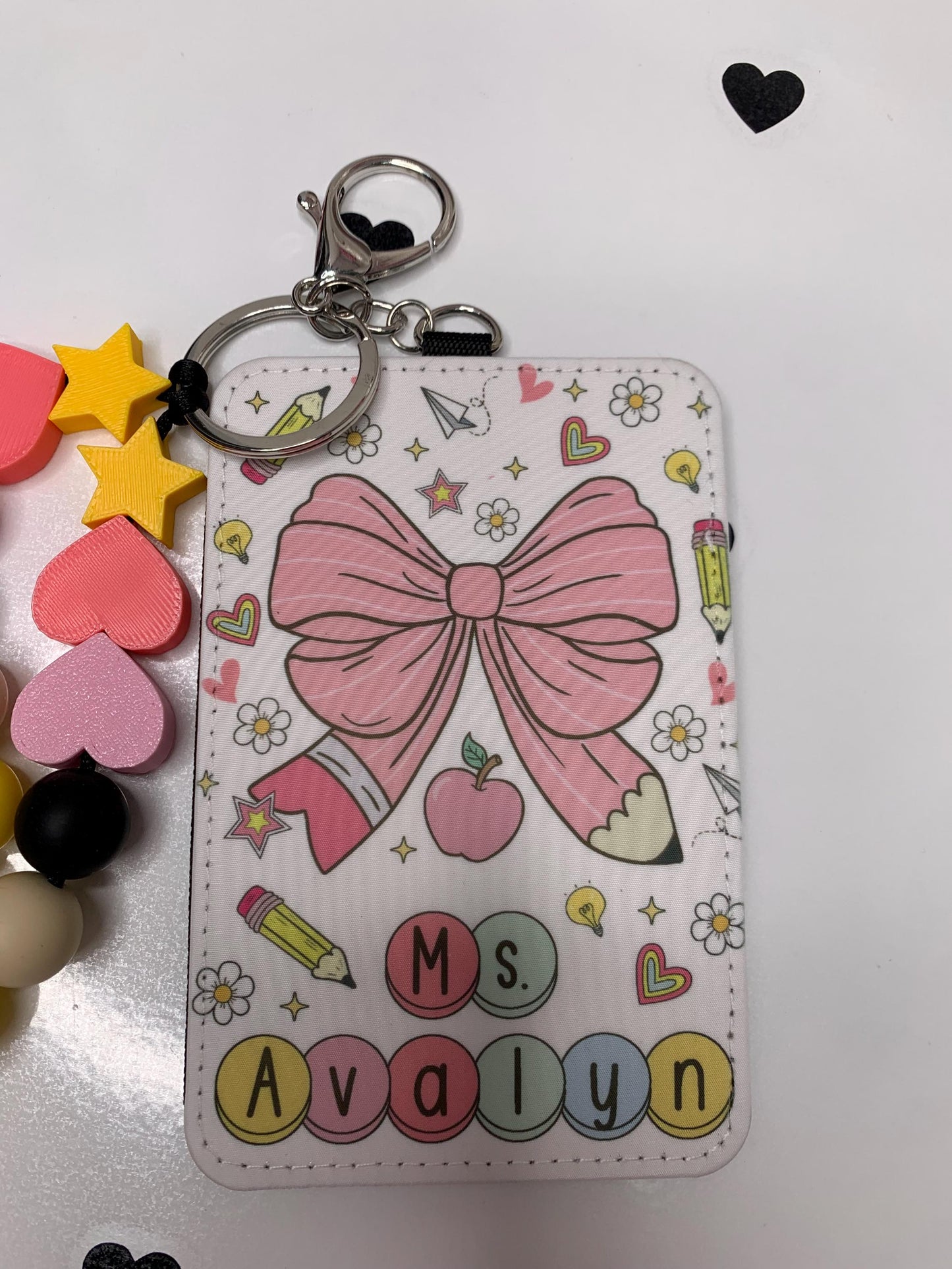 “Personalized pencil ID badge holder with lanyard”

“Teacher name tag with 2 slot design”

“Back-to-school gift for teachers and staff”